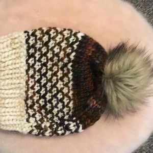 A set of Rebecca stitch hats for adult women